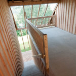 Design holiday Houses Rajsko - covered porch with view to Otava river valley devides 2 apartments